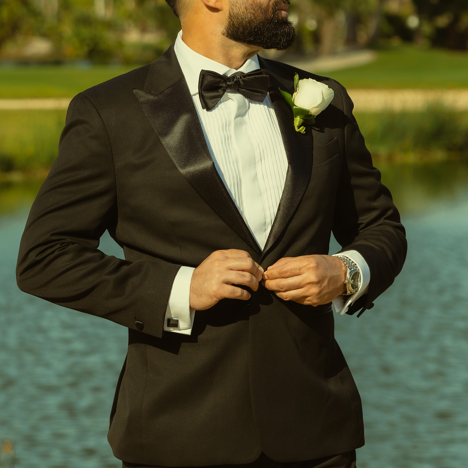 Groom Detail Portraits in JW Marriott Turnberry in Aventura Golf Course with Miami Skyline. 