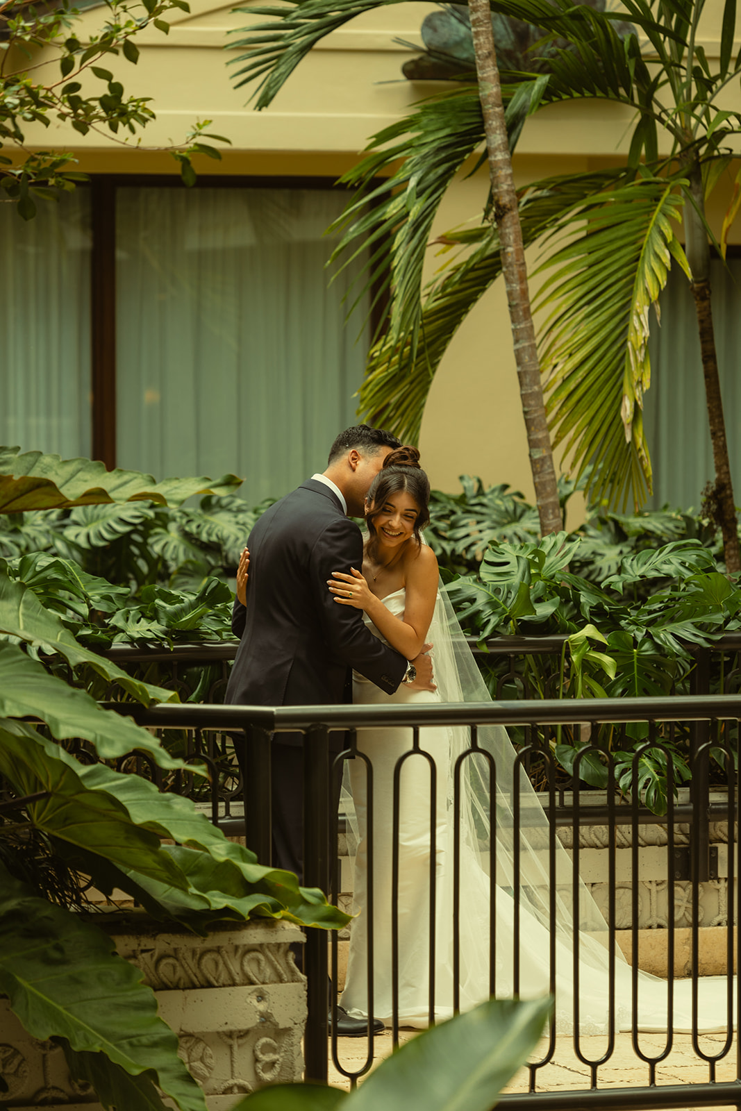 Bride and Groom First Look Hugging Timeless Wedding in Mayfair Hotel & Garden