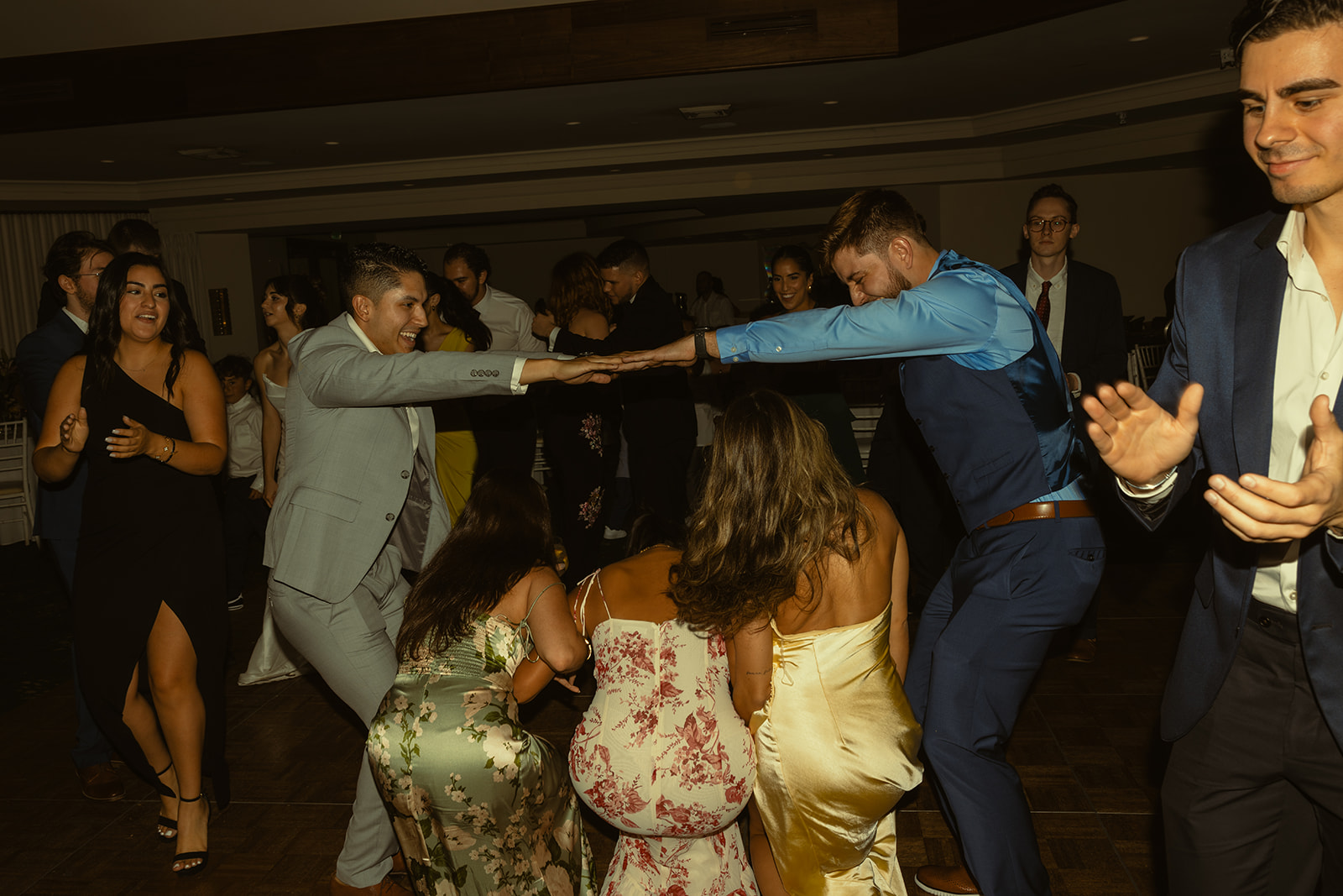 Playful Dancing Reception Guests Candids Timeless Wedding in Mayfair Hotel & Garden