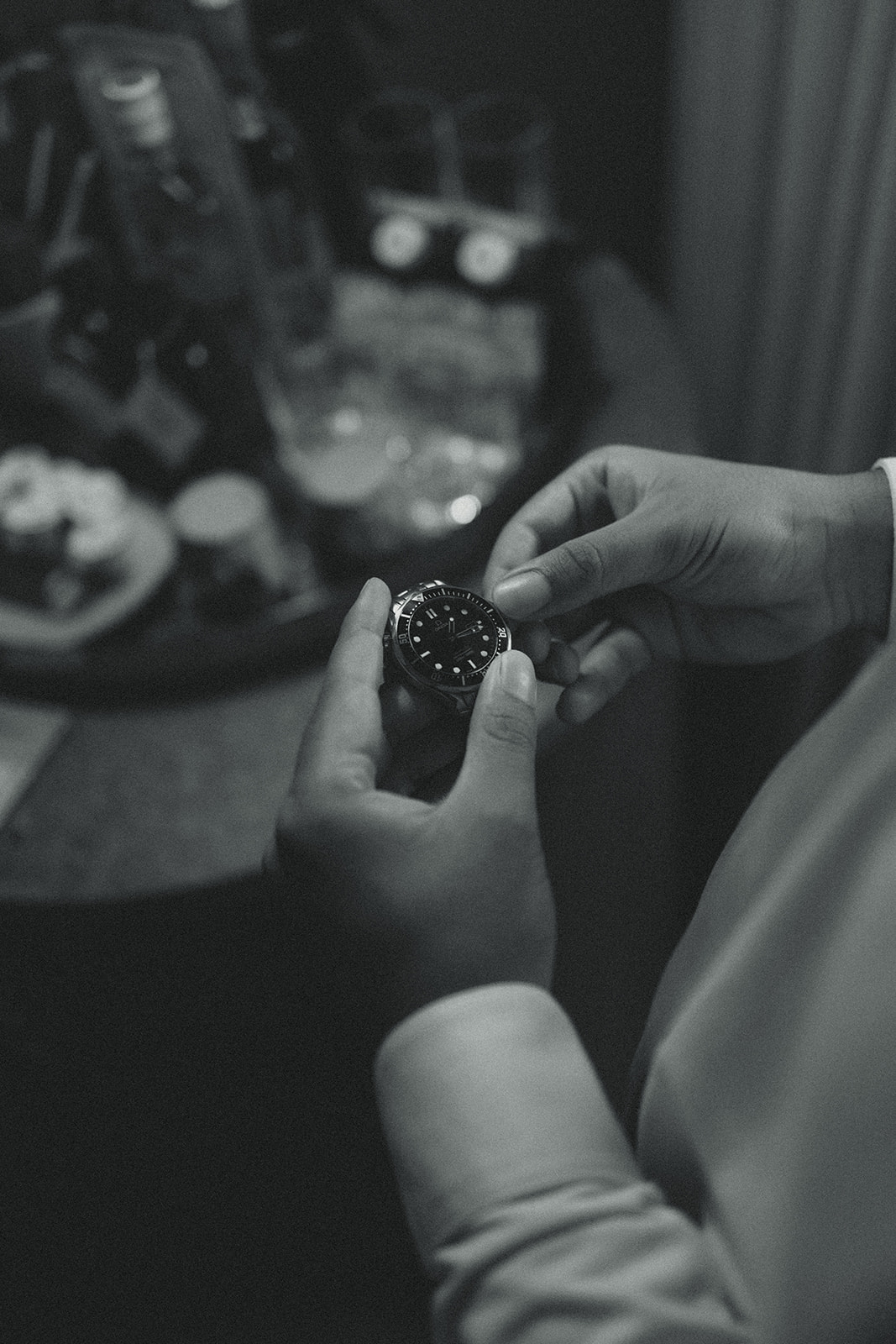 Groom Fixing Watch Black and White Timeless Wedding in Mayfair Hotel & Garden