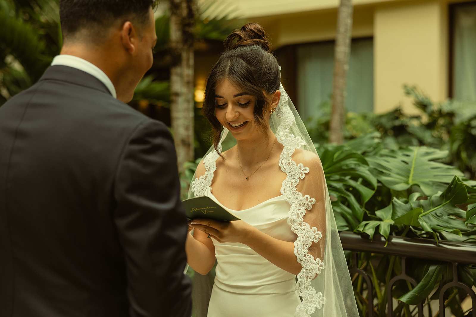 Bride laughing during Vow Exchange Timeless Wedding in Mayfair Hotel & Garden