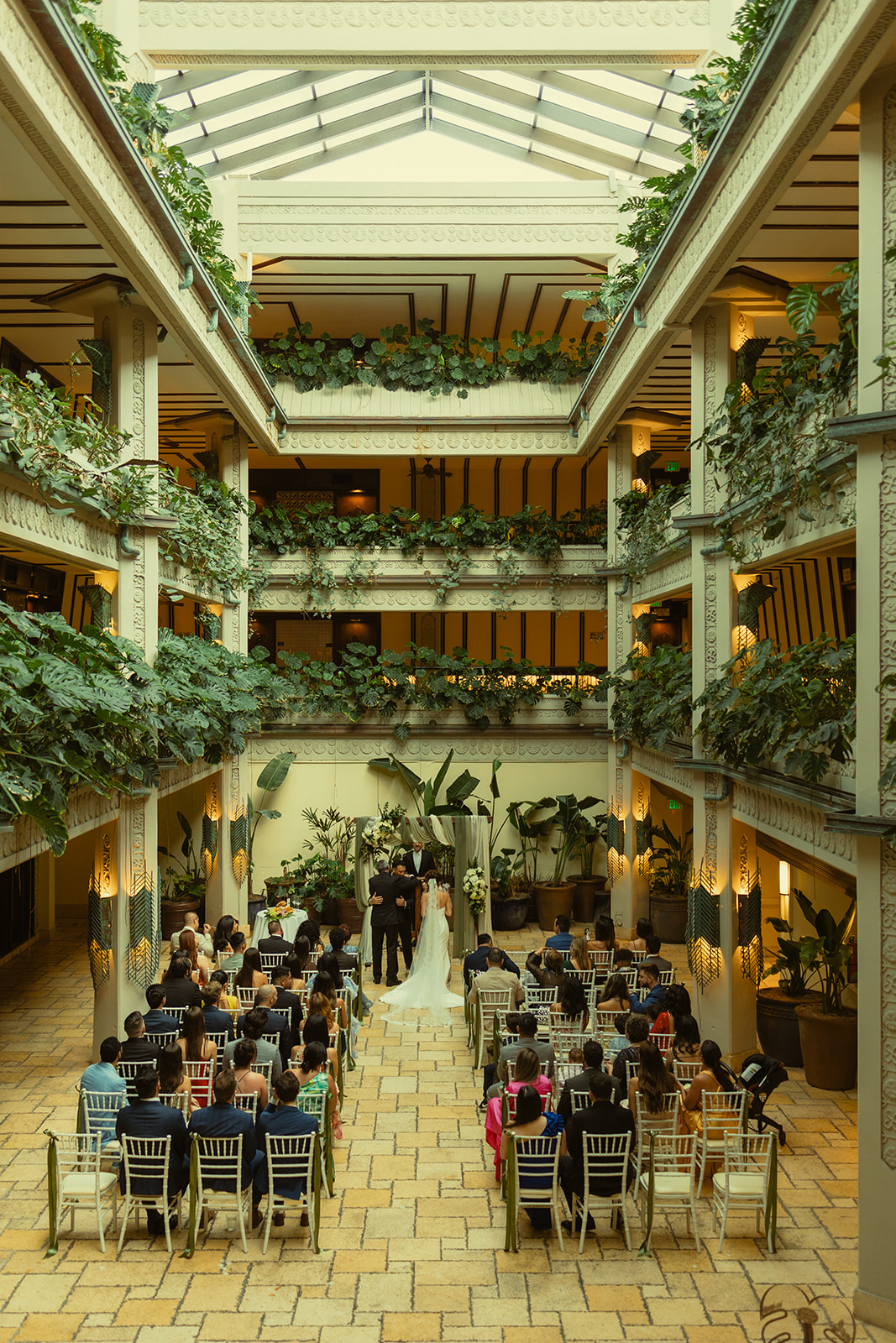 Bride walking down aisle to wedding ceremony Timeless Wedding in Mayfair Hotel & Garden