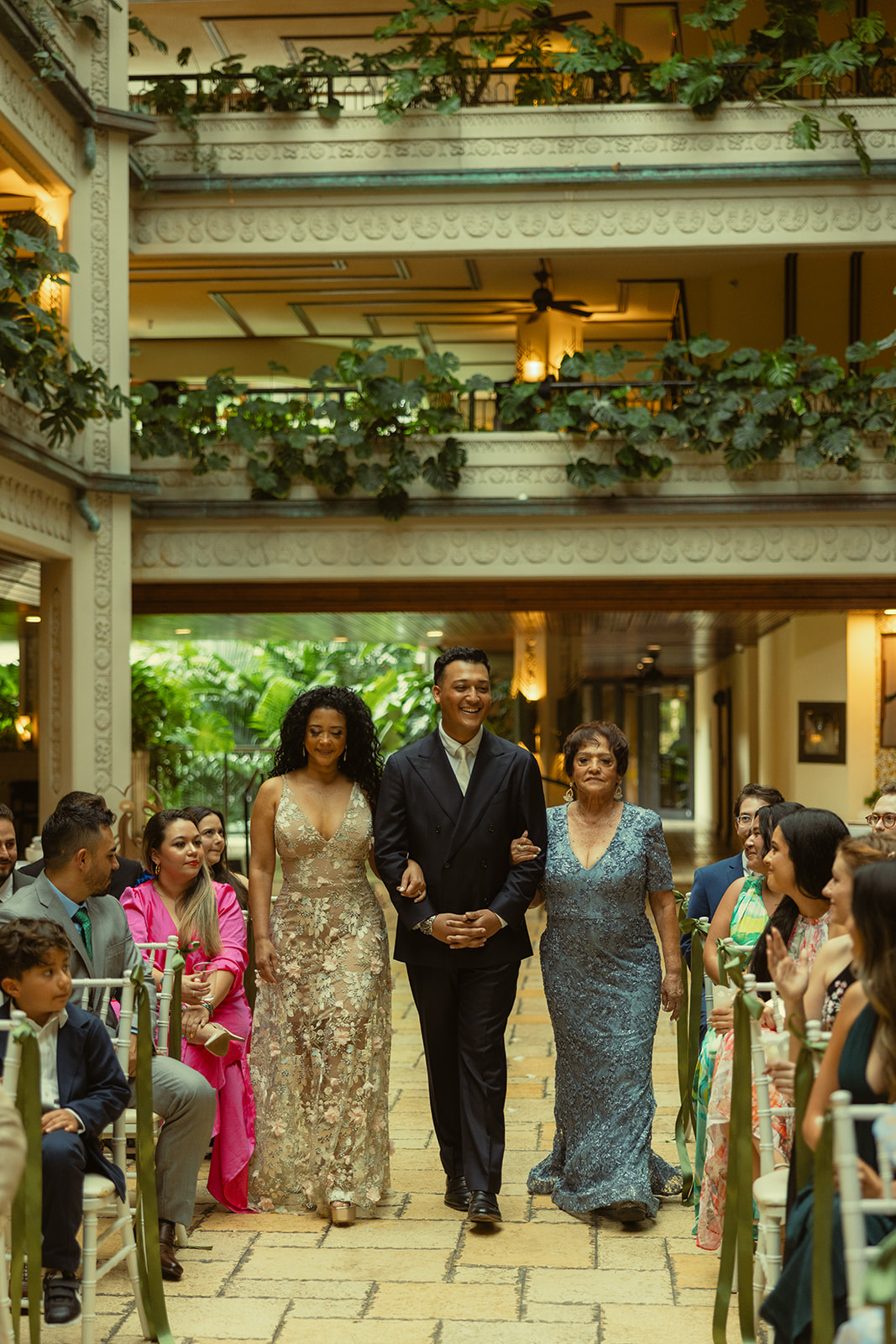 Groom walking aisle with Mother and Grandma Wedding Ceremony Timeless Wedding in Mayfair Hotel & Garden