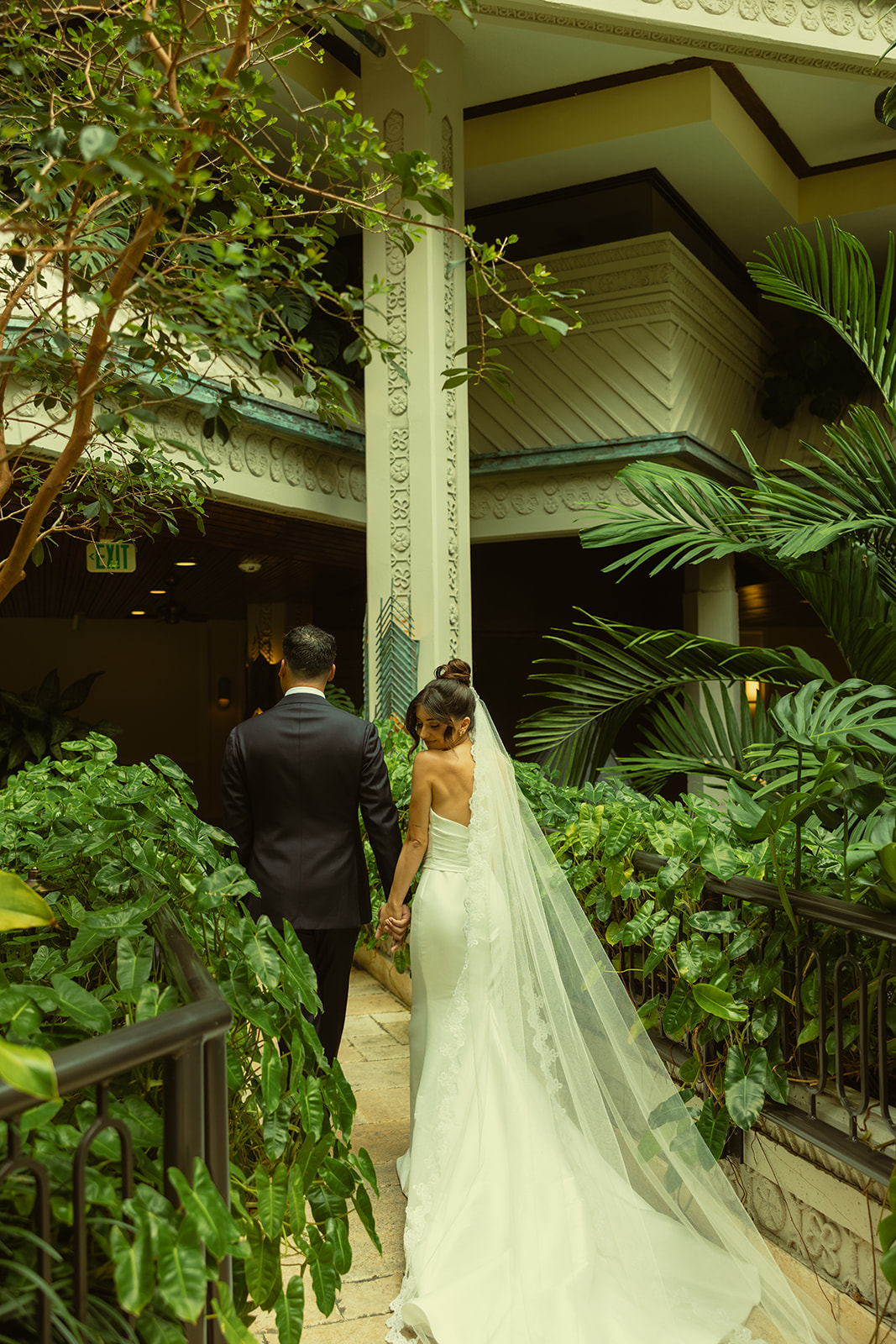 Bride & Groom Walking Away Wedding Portraits Timeless Wedding in Mayfair Hotel & Garden