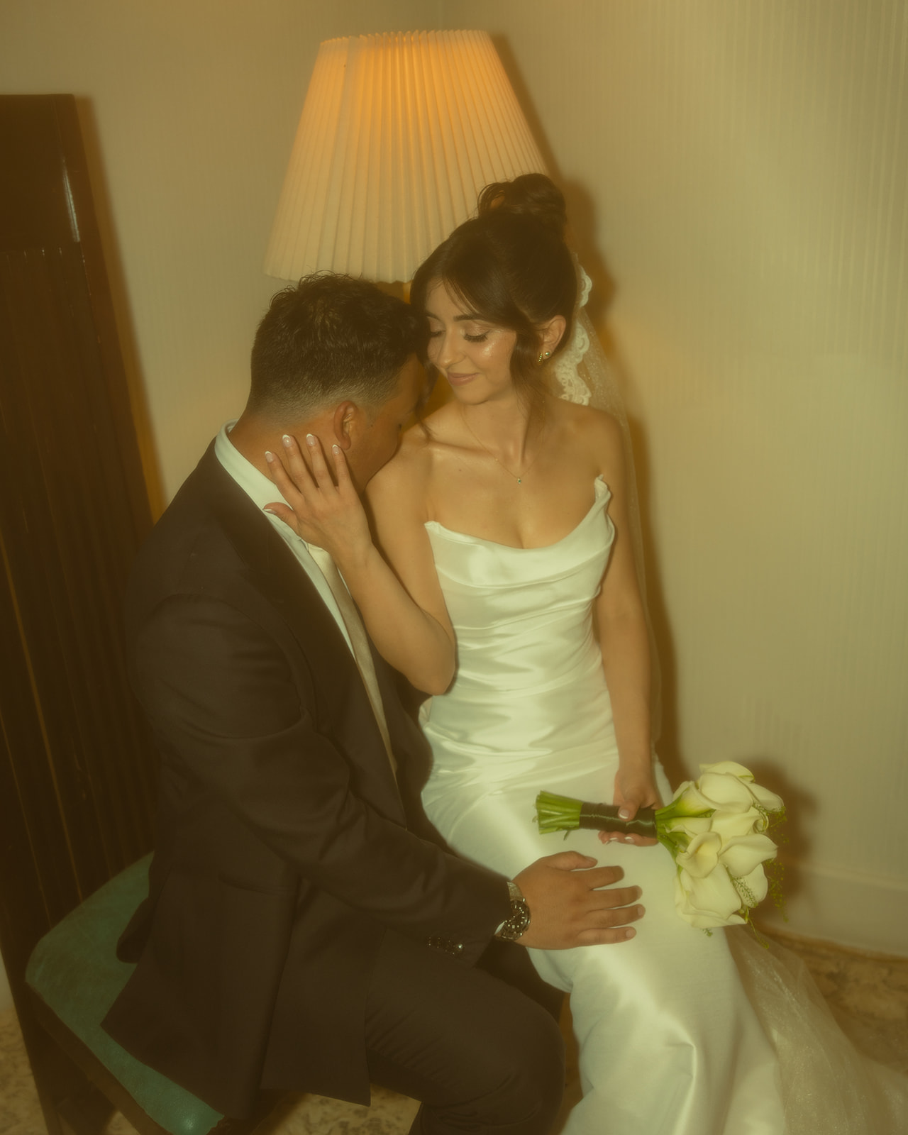 Groom Kissing Bride Shoulder Wedding Portraits Timeless Wedding in Mayfair Hotel & Garden