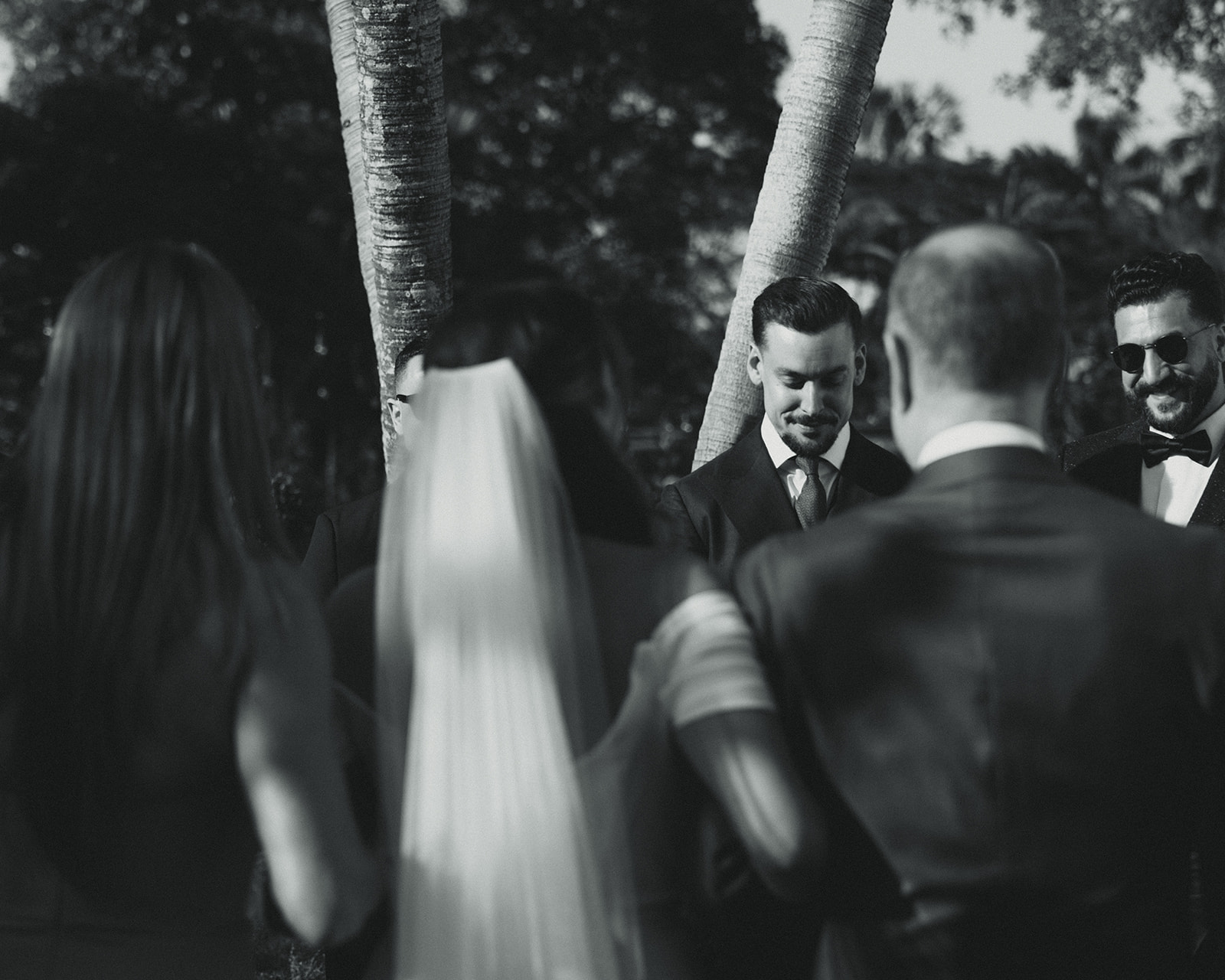 Emotional groom wedding ceremony dreamy and elevated intimate backyard wedding by Aileen Ayala Photography black and white