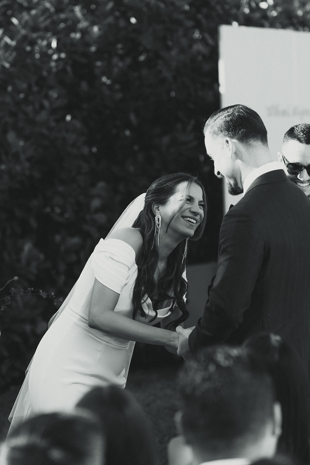 laughing bride and groom wedding ceremony dreamy and elevated intimate backyard wedding by Aileen Ayala Photography