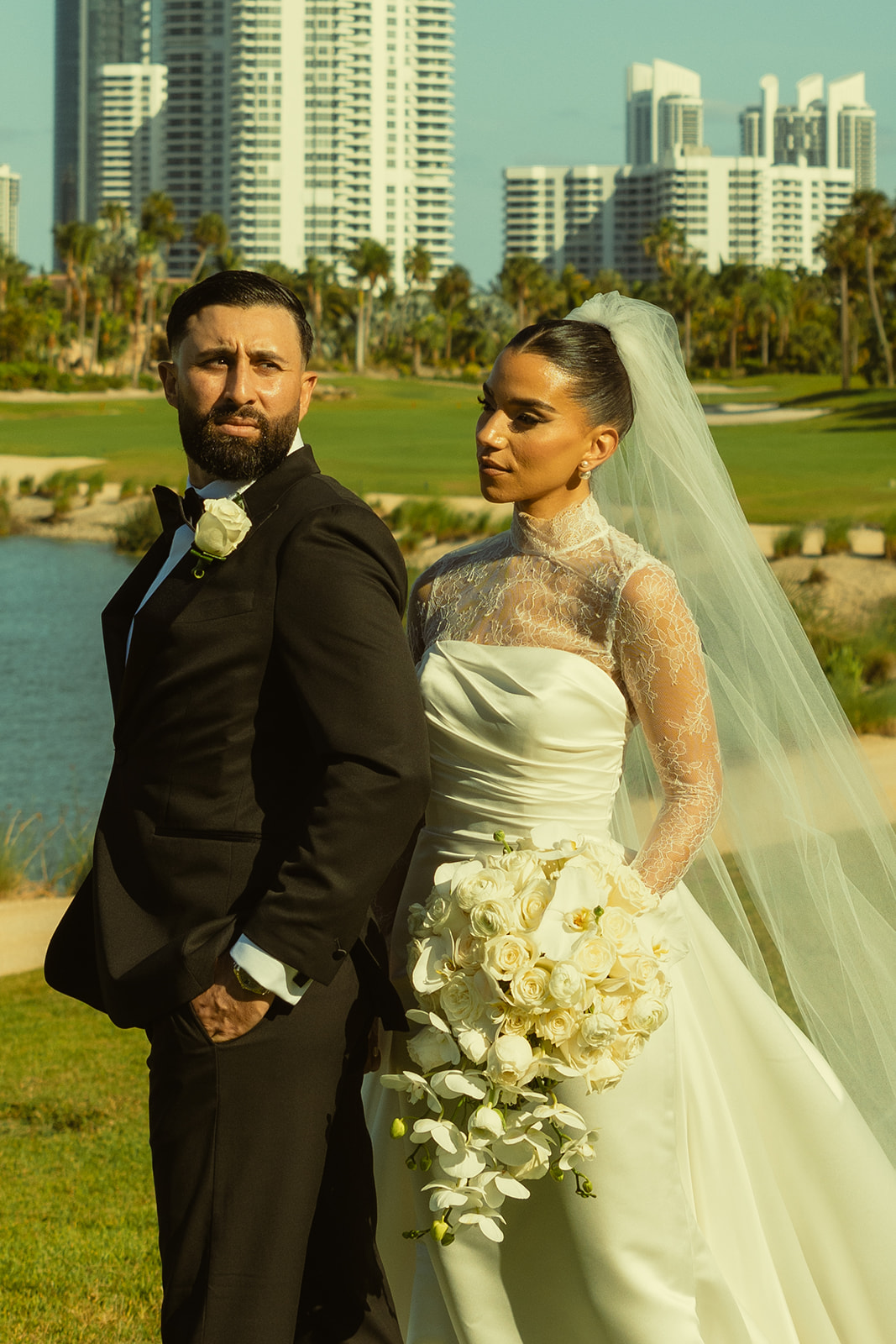 Editorial Newly Wed Portraits on Golf Course Aventura Florida. Documentary Wedding Photographer.