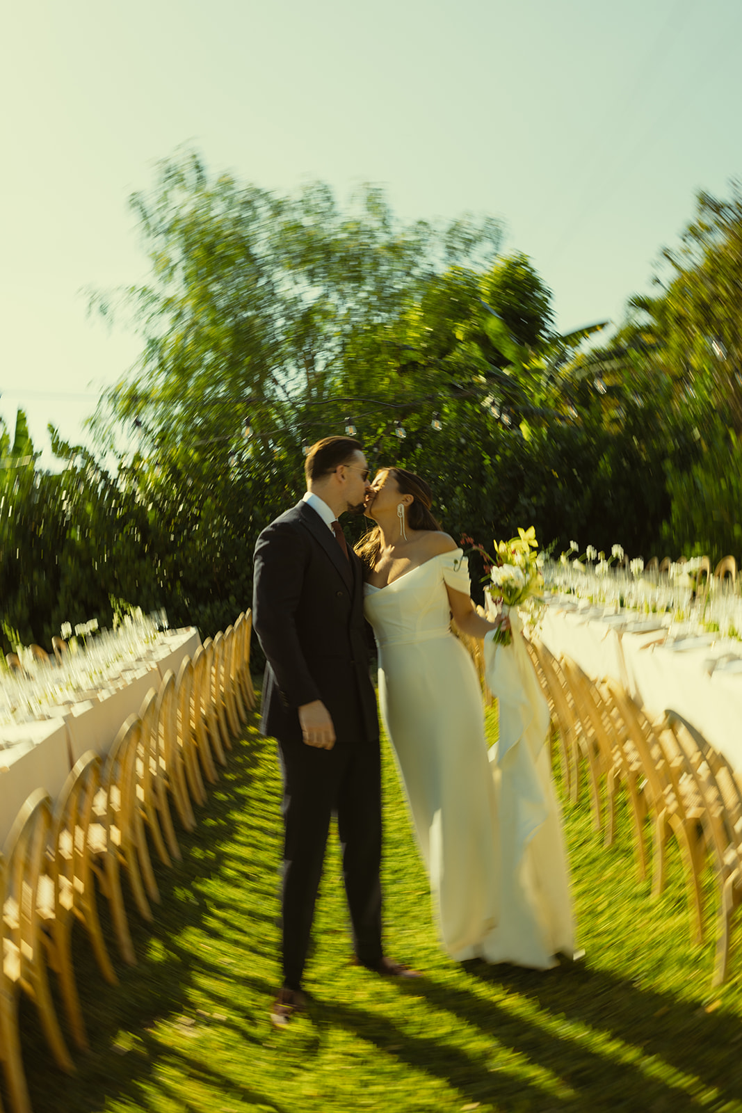 Walking Bride & Groom couple portraits dreamy and elevated intimate backyard wedding by Aileen Ayala Photography motion blur