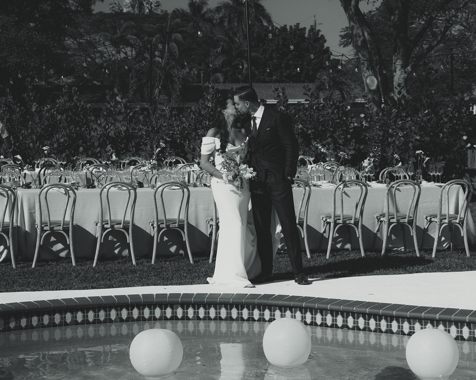 Kissing Bride & Groom couple portraits dreamy and elevated intimate backyard wedding by Aileen Ayala Photography Black and White