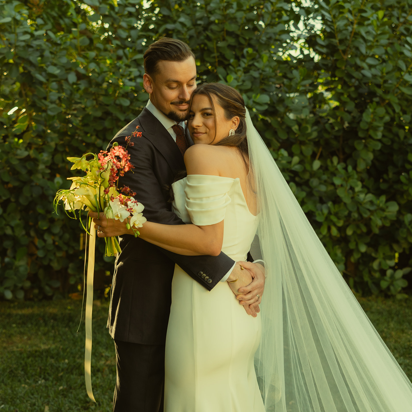 Cuddling Bride & Groom couple portraits dreamy and elevated intimate backyard wedding by Aileen Ayala Photography