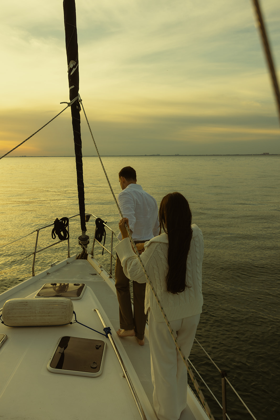 Sailboat Engagement Session in Miami, Walking into Sunset, NYC Harbor Inspo