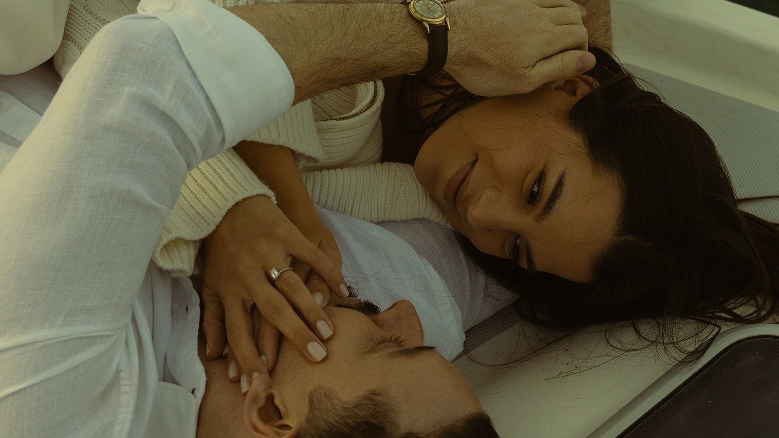 Sailboat Engagement Session in Miami, Laying on Sailboat Cuddled