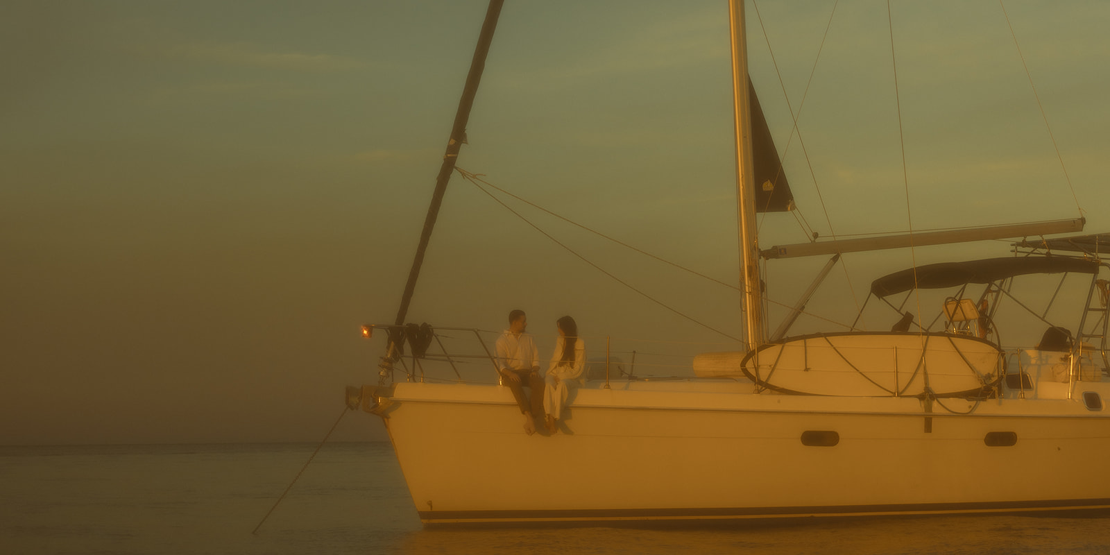 Sailboat Engagement Session in Miami, NYC Harbor Chatting Documenting Couple