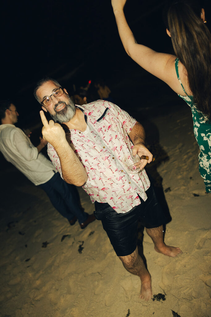 British Virgin Island Editorial and Documentary Wedding Photographer Jumping into Water Wedding Reception