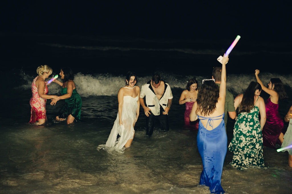 British Virgin Island Editorial and Documentary Wedding Photographer Jumping into Water Wedding Reception