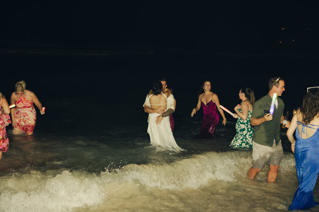 British Virgin Island Editorial and Documentary Wedding Photographer Jumping into Water Wedding Reception