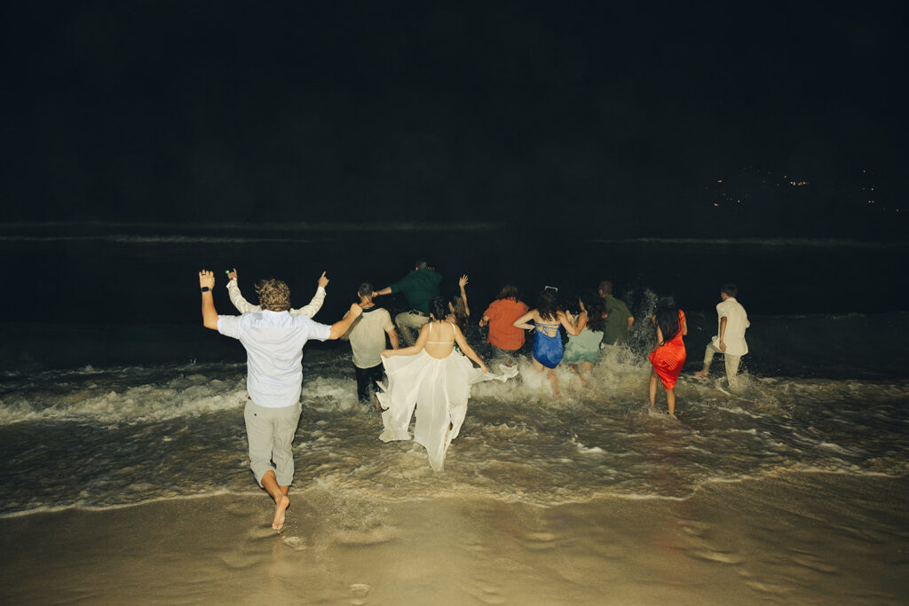 British Virgin Island Editorial and Documentary Wedding Photographer Jumping into Water Wedding Reception