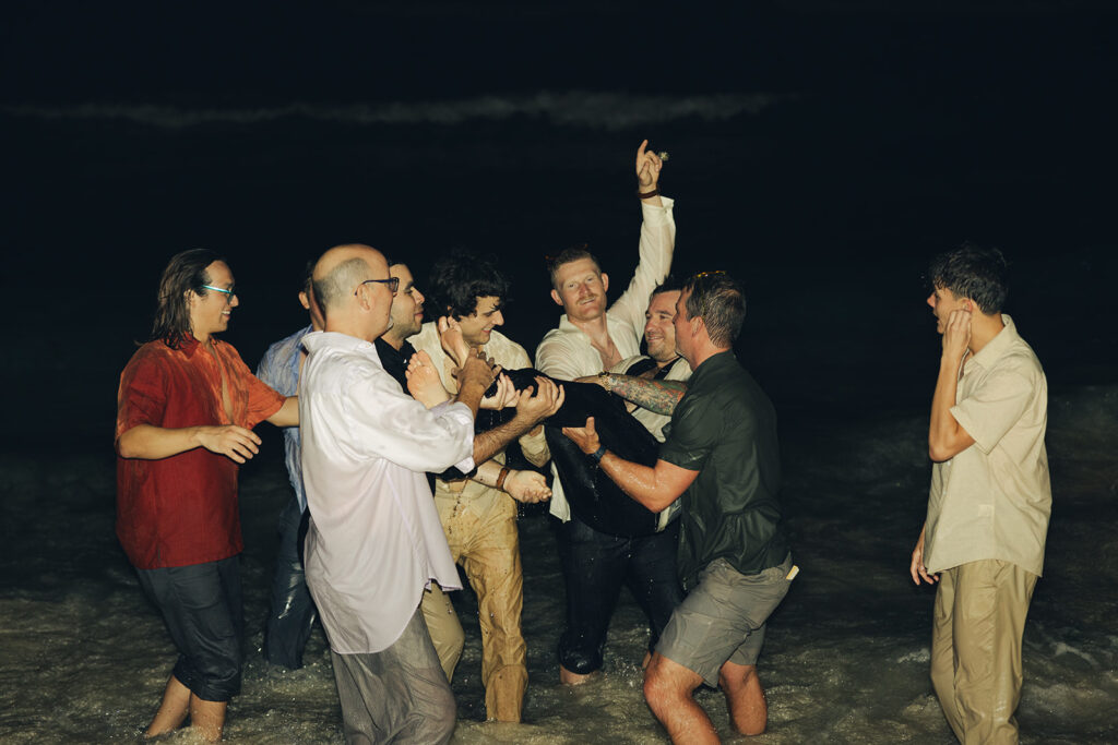 British Virgin Island Editorial and Documentary Wedding Photographer Jumping into Water Wedding Reception