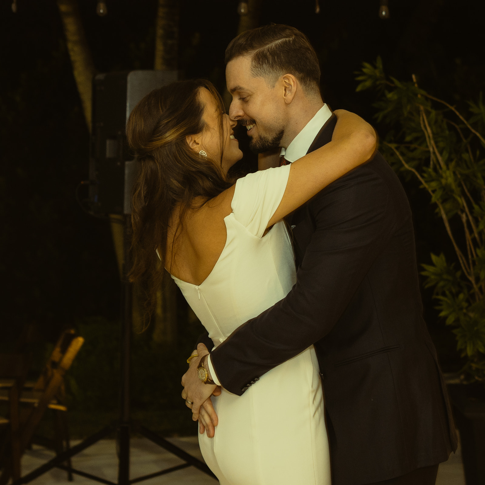 bride and groom dancing close during reception dreamy and elevated intimate backyard wedding by Aileen Ayala Photography 