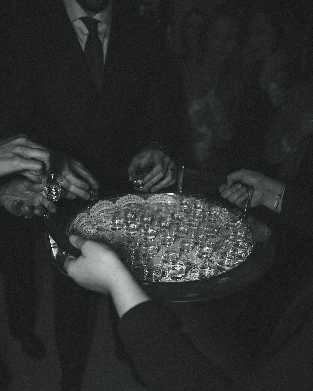 black and white shots handouts during reception dreamy and elevated intimate backyard wedding by Aileen Ayala Photography black and white