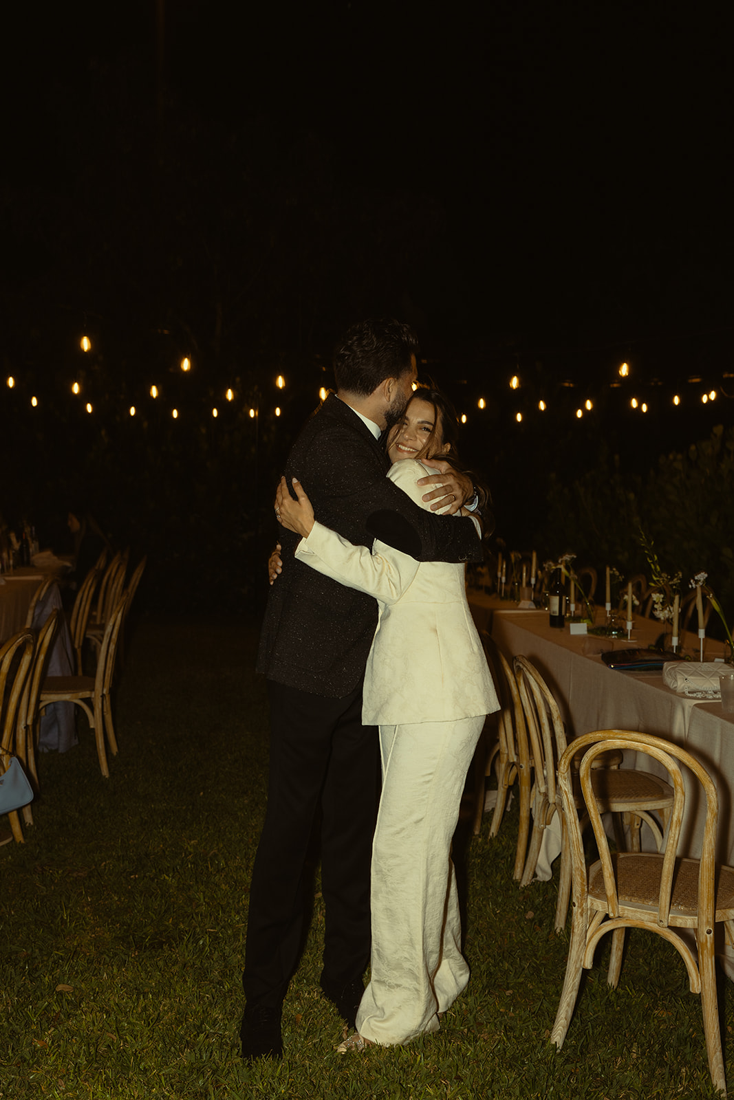 bride and brother hugging dancing dreamy and elevated intimate backyard wedding by Aileen Ayala Photography 