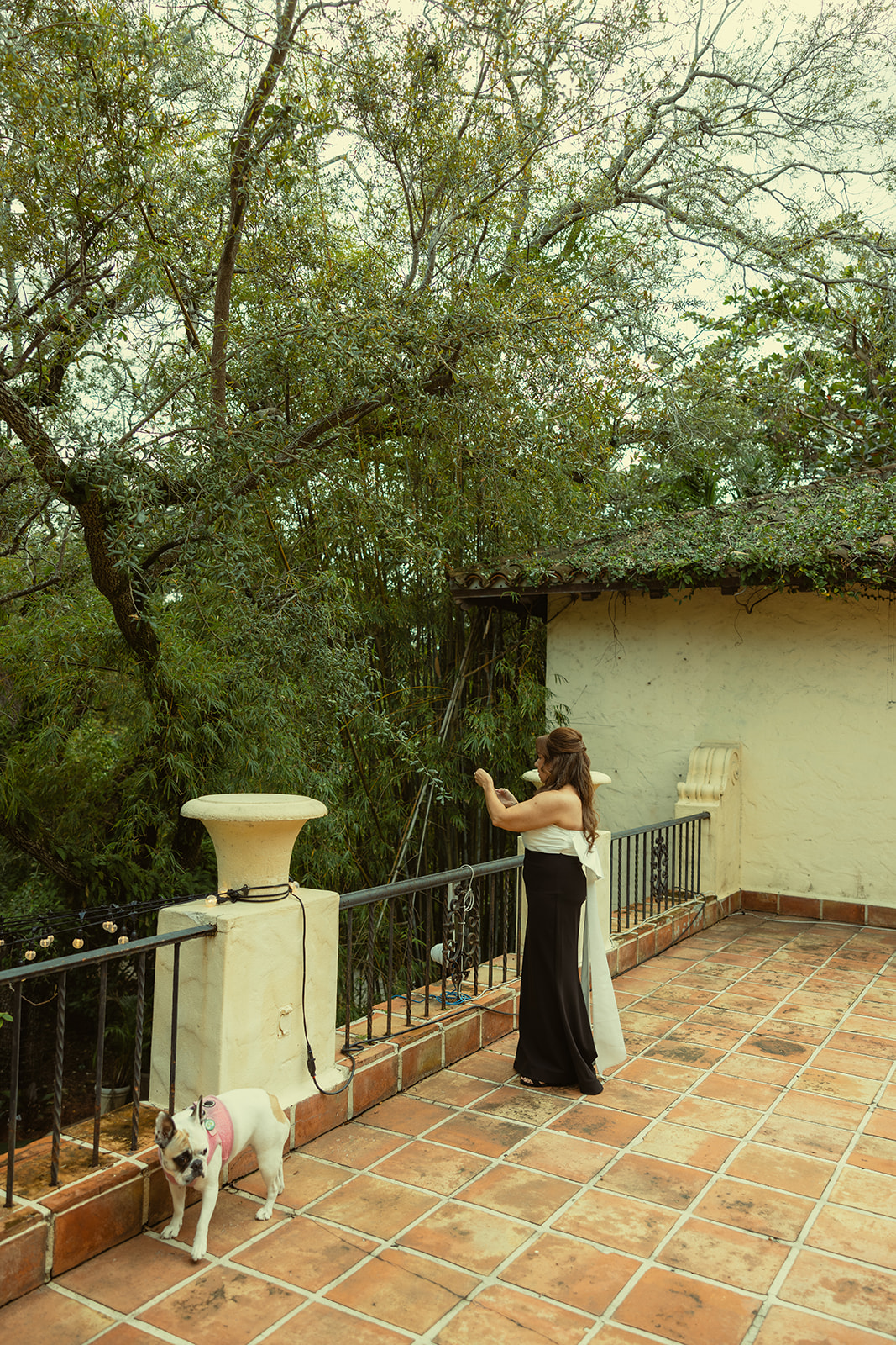 Documentary Wedding Mother of Bride Overviewing Reception Space from Bridal Suite Balcony Getting Ready Suite Villa Woodbine Tuscany-Inspired Venue