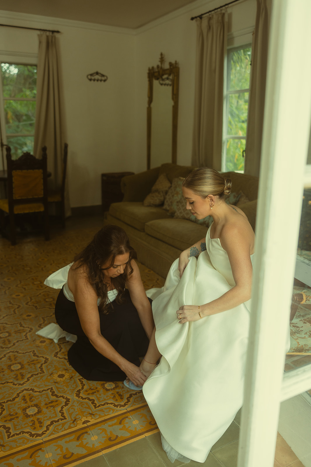 Documentary Wedding Bride Putting Heels On Bridal Suite Villa Woodbine Tuscany-Inspired Venue