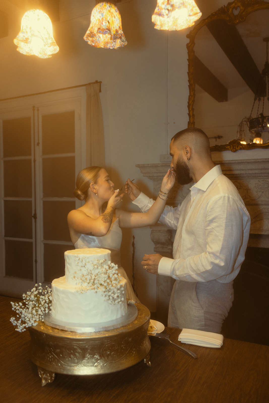 Feeding Cake Bride Groom Cake Cutting Villa Woodbine Tuscany-Inspired Venue in Miami Florida