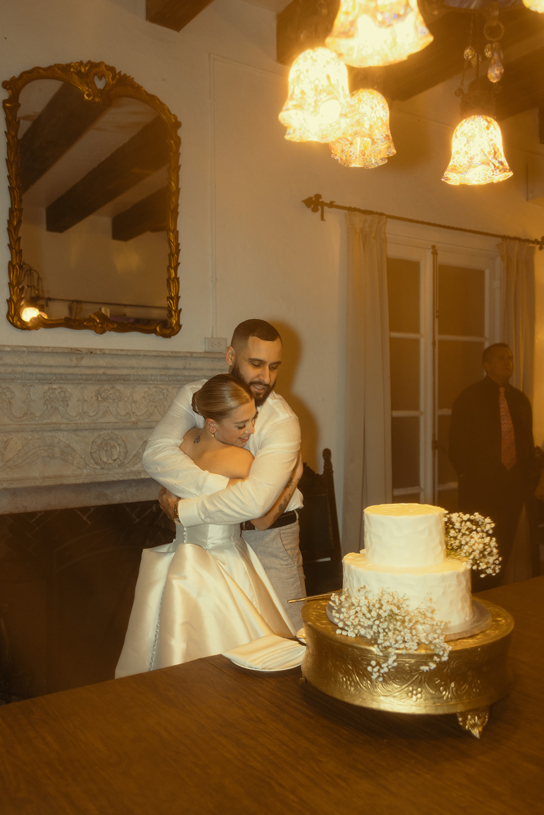 Hugging Bride Groom Cake Cutting Villa Woodbine Tuscany-Inspired Venue in Miami Florida