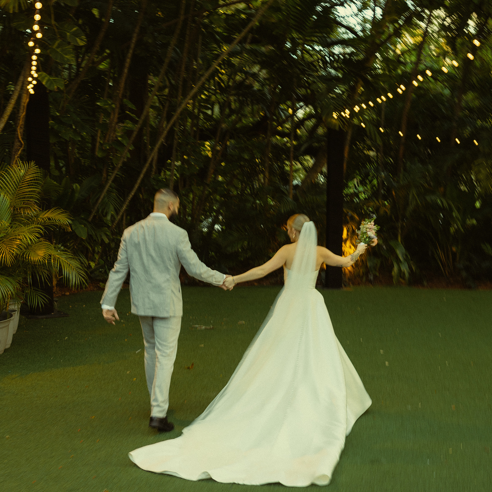 Fun and Playful Newly Weds Couple Portraits Villa Woodbine Tuscany-Inspired Venue in Miami Florida Twinkle Lights Running