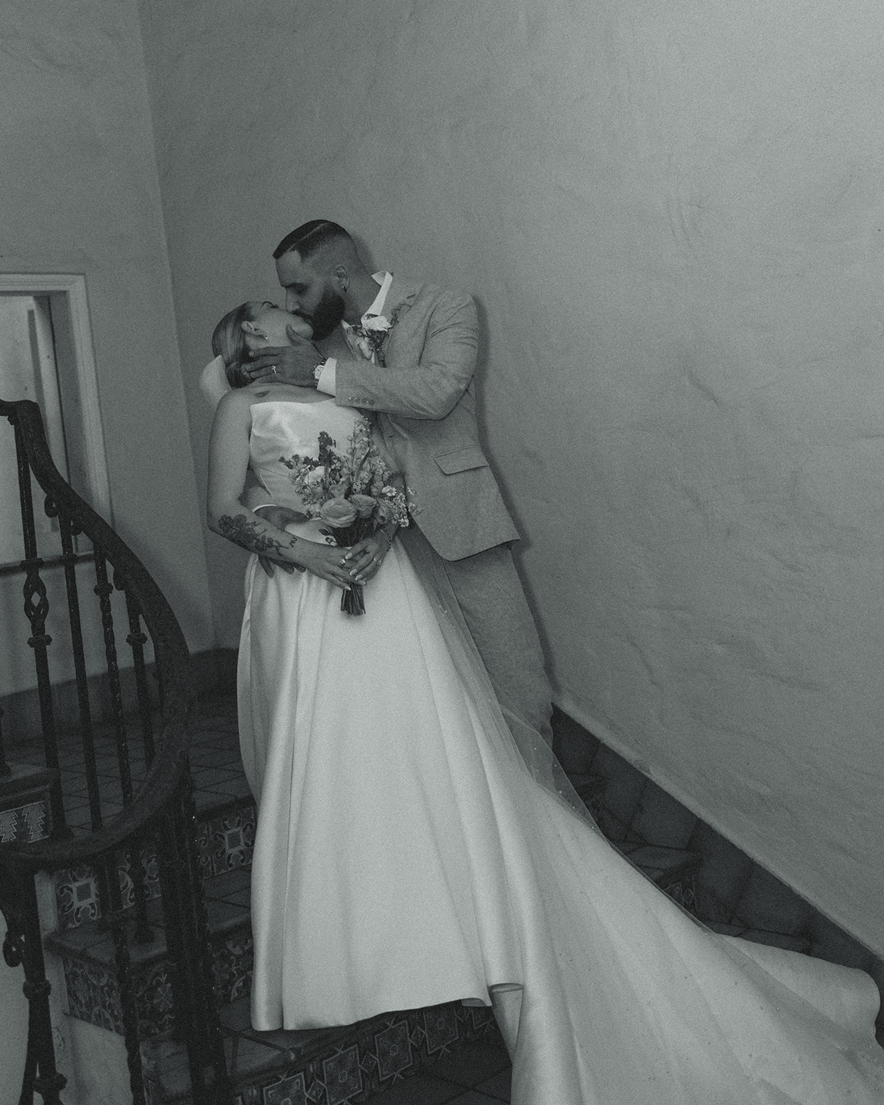 Newly Weds Couple Portraits Stairs Villa Woodbine Tuscany-Inspired Venue in Miami Florida Black and White Kissing Couple