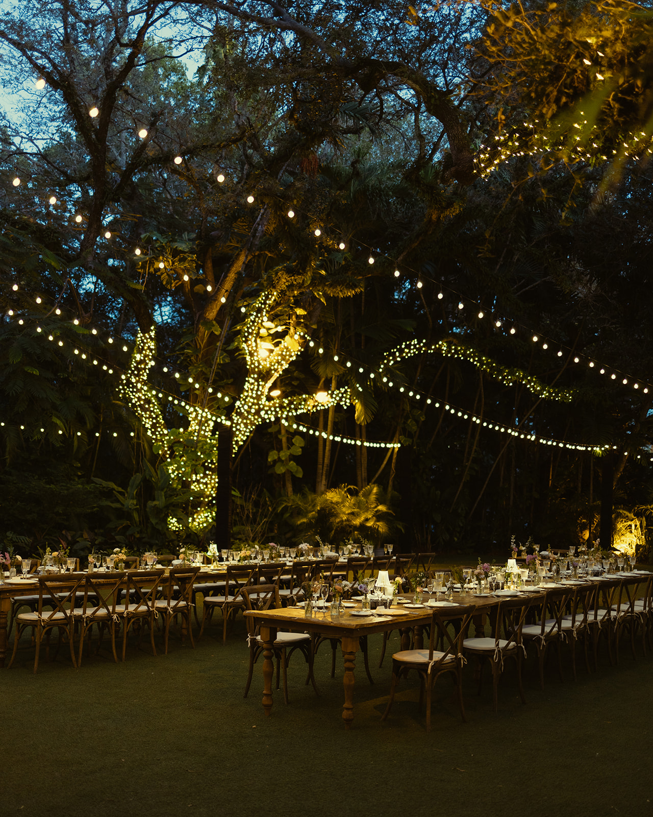 Dinner and Reception Details Villa Woodbine Tuscany-Inspired Venue Spring Colors Night time Twinkle Lights Reception Space