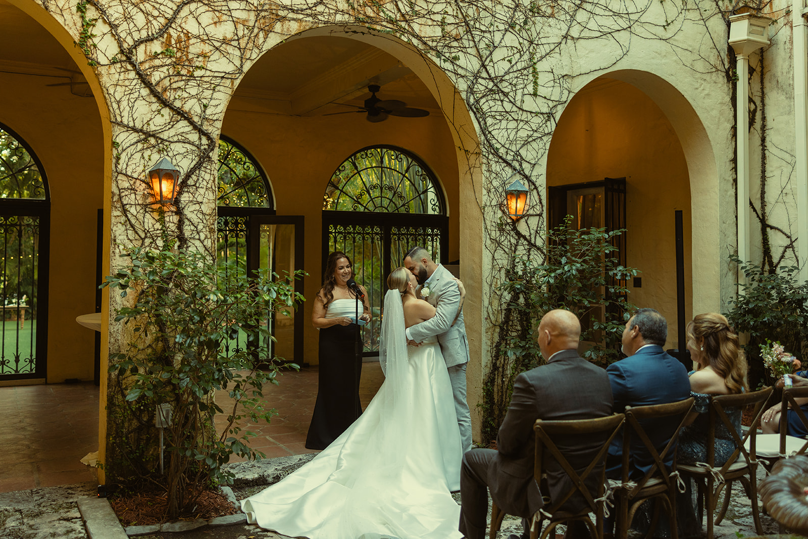 Documentary Wedding Ceremony Candid Villa Woodbine Tuscany-Inspired Venue in Miami Florida Italian Archways First Kiss