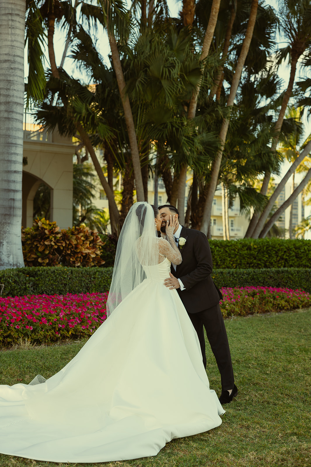 Bride and Groom Kissing during First Look for wedding at JW Marriott Turnberry Resort in Miami Authentic Reaction