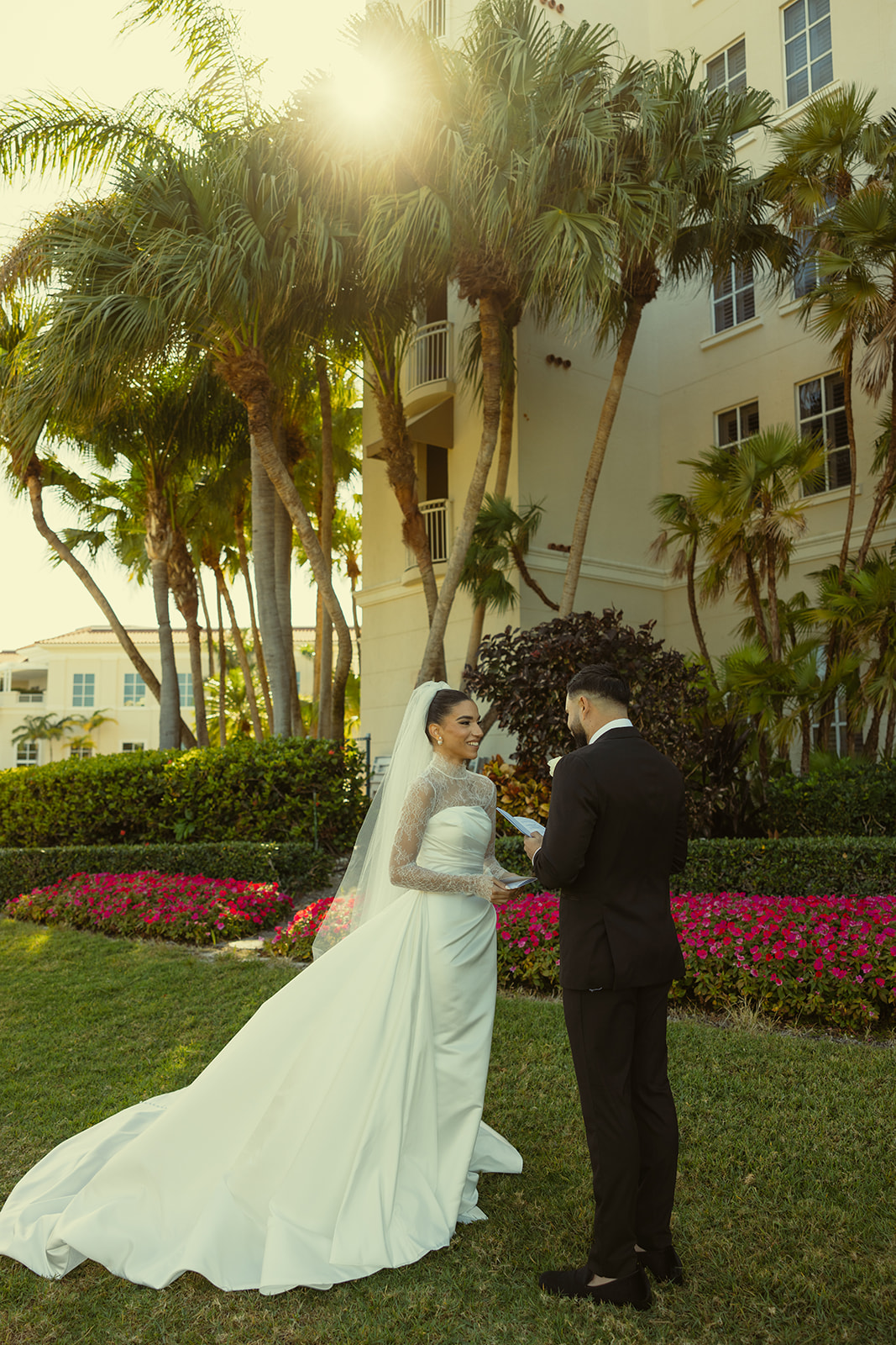 Smiling Bride and Groom Private Vow Exchange Sun Peaking Through the Trees JW Miami Turnberry Resort Documentary Wedding Photographer