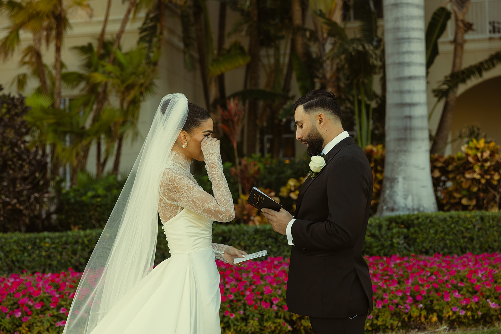 Bride crying during vow exchange with Groom at the JW Miami Turnberry Resort. Documentary Miami Wedding Photographer. Essense of Australia Wedding Dress