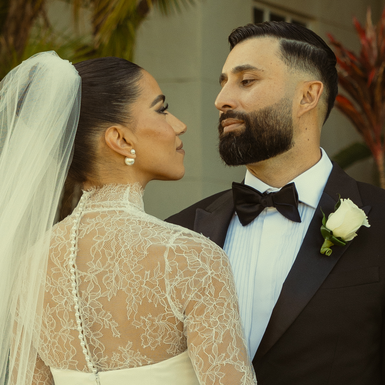 Close up of Bride & Groom. Soft Bridal Glam. Big Pearl Earring Studs. Editorial Newly Wed Portrait. JW Turnberry Miami.