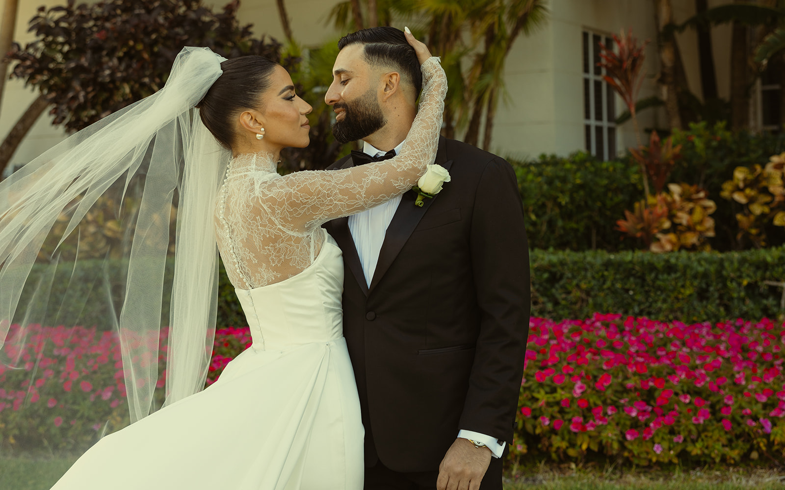 Close up of Bride & Groom look at each other. Soft Bridal Glam. Big Pearl Earring Studs. Editorial Newly Wed Portrait. JW Turnberry Miami.