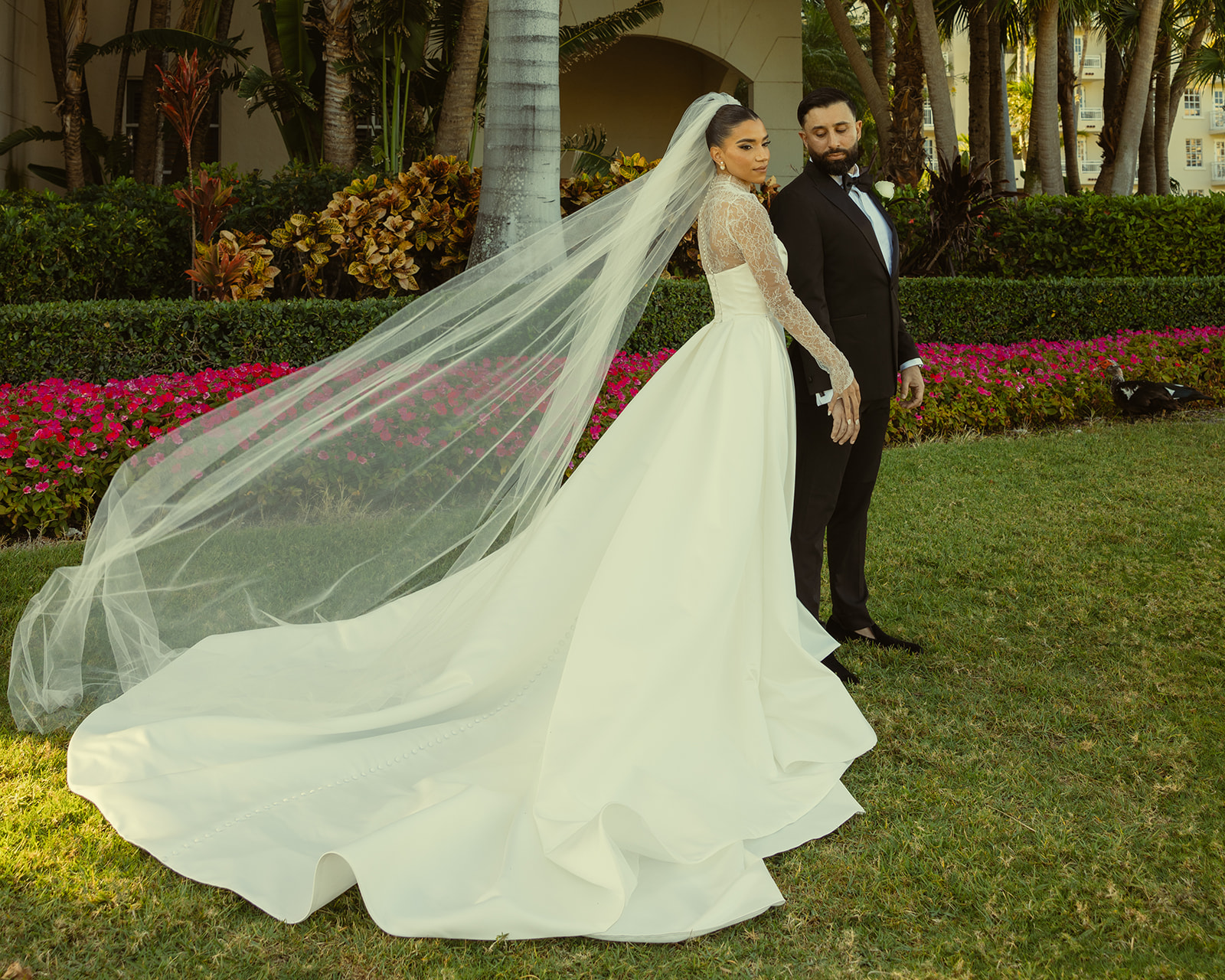 Wide Shot of Bride & Groom. Soft Bridal Glam. Big Pearl Earring Studs. Editorial Newly Wed Portrait. JW Turnberry Miami. Essense of Australia Wedding Dress