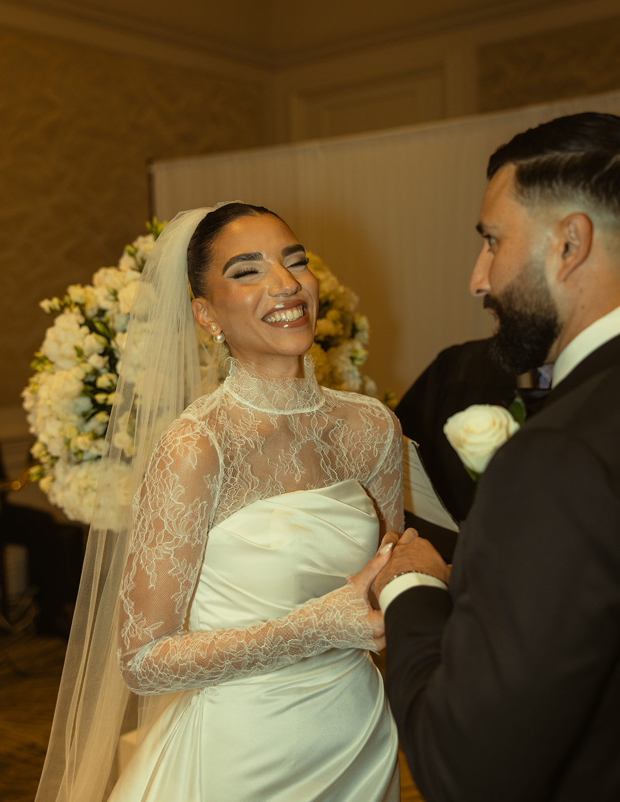 Bride Laughing during wedding ceremony at JW Marriott Turnberry Ballroom Wedding Ceremony Photography