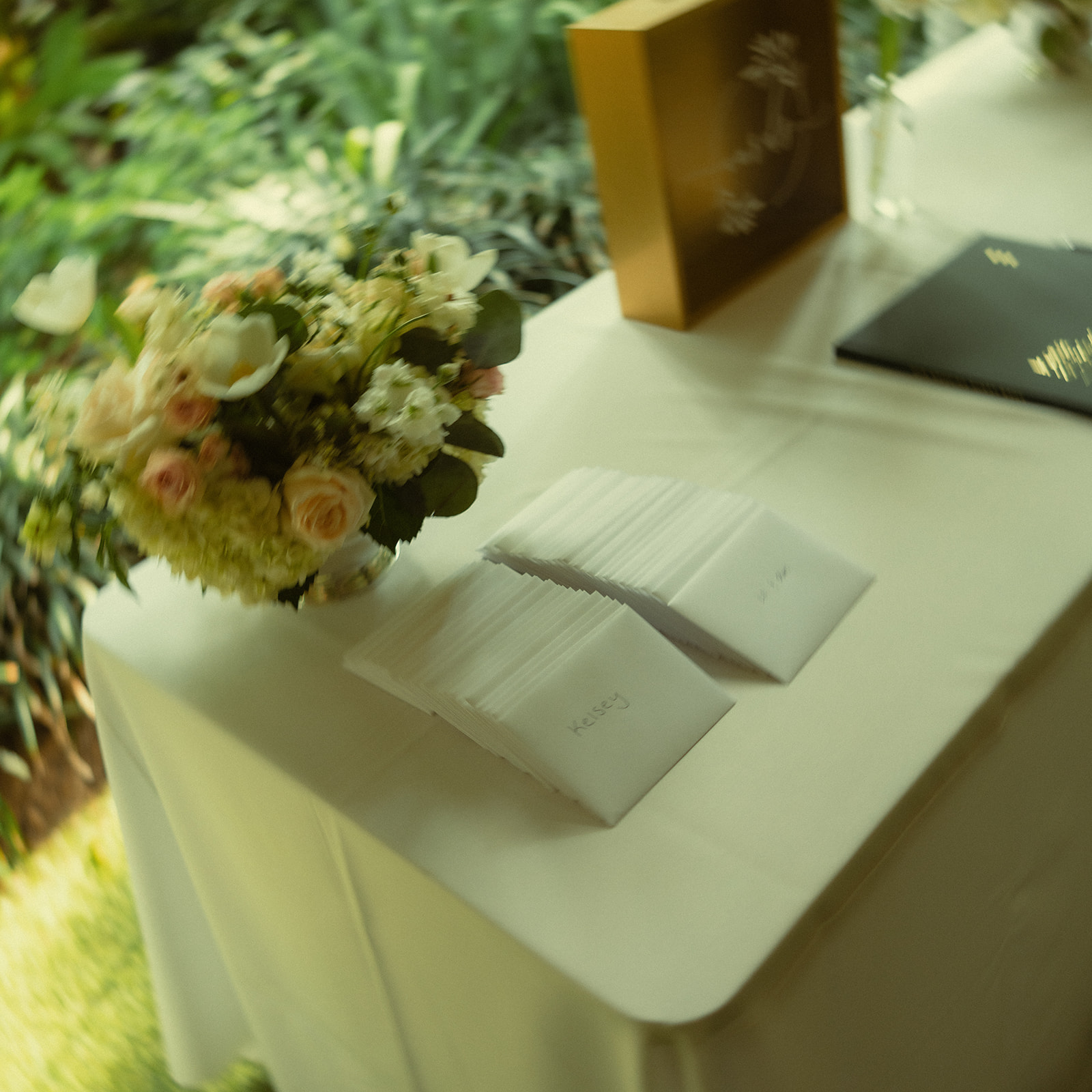 St.Petersburg Wedding Welcome Table with Pink and White Roses Arrangement and welcome cards for guests