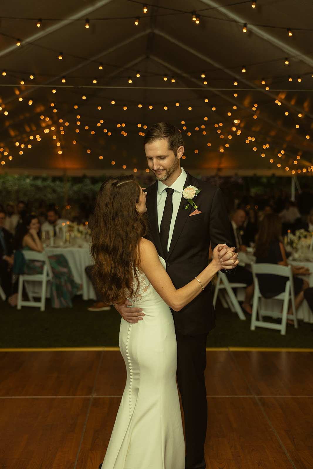 Bride and Groom First Dance Twinkle Lights in Tented Reception Space Sunken Gardens in St.Petersburg