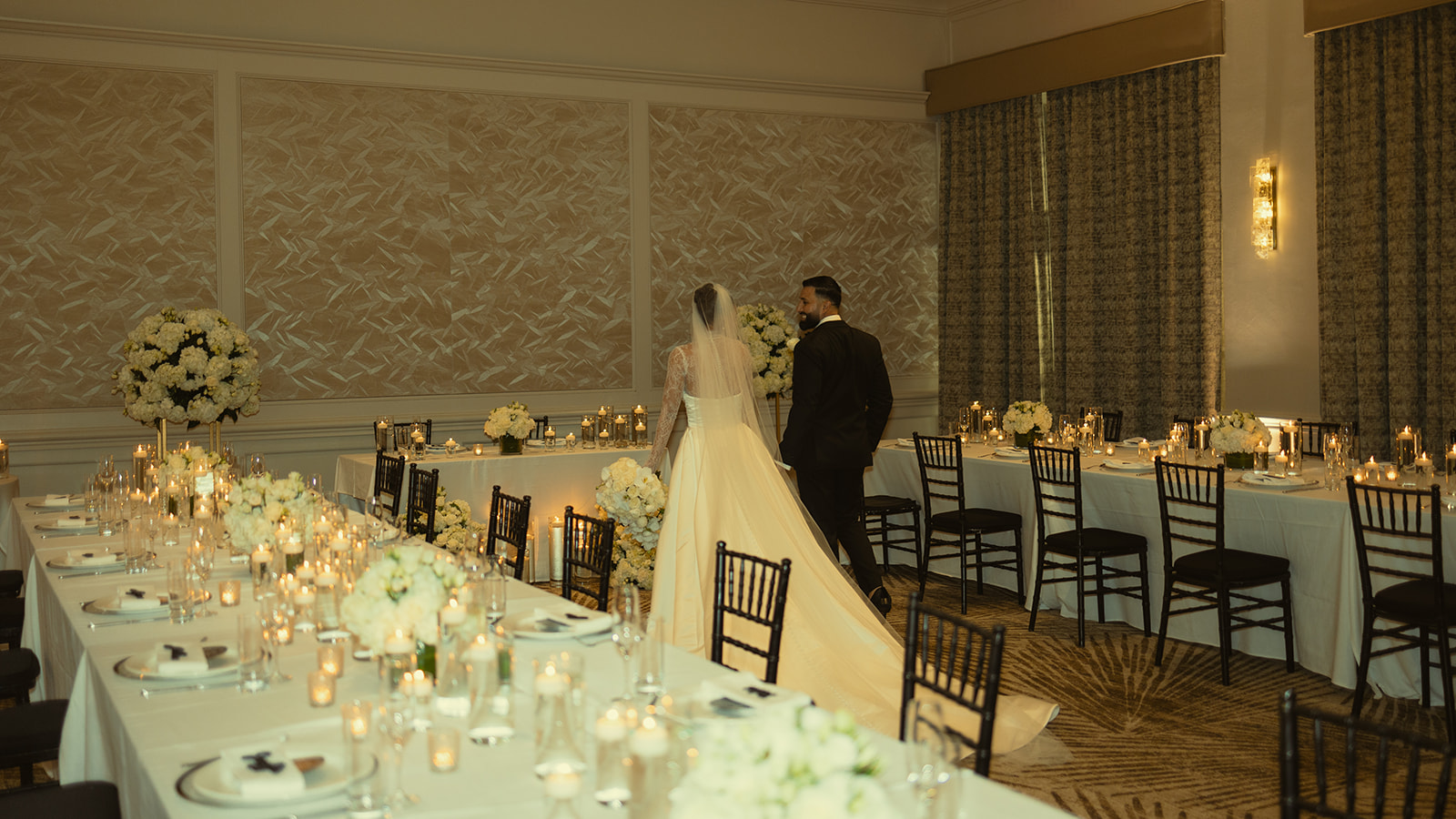 Bride and Groom Room Reveal JW Marriott Turnberry in Miami Aventura Florida. White Roses. Elegant and simple Tables cape and big floral arrange