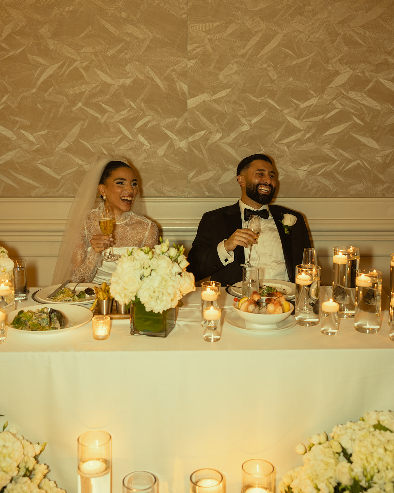 Laughing Bride & Groom Candids during wedding speeches. JW Marriott Turnberry in Aventura Florida