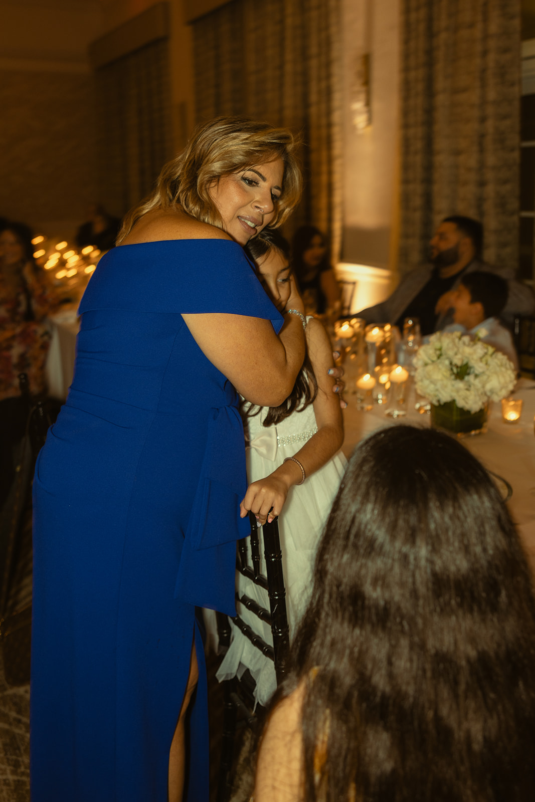 Wedding Guests hugging Candids during Intimate Dinner Reception at the JW Marriott Turnberry in Miami