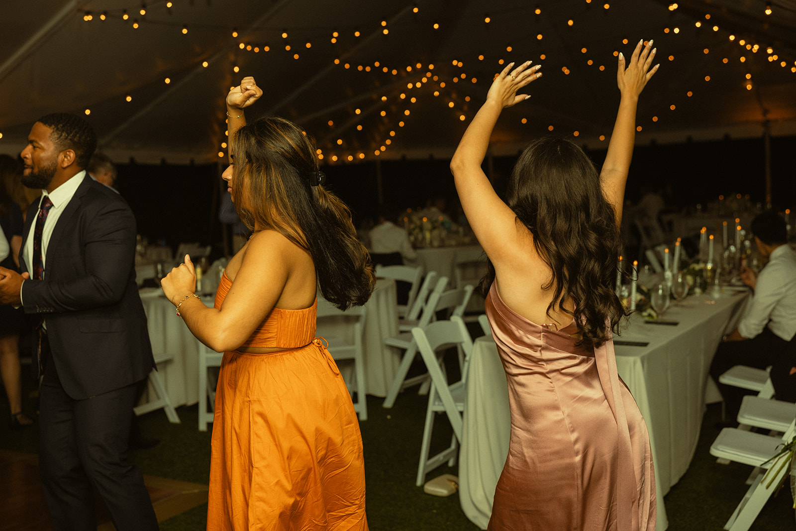 Guests Dancing during reception. Wedding in West Florida, St Petersburg in Sunken Gardens