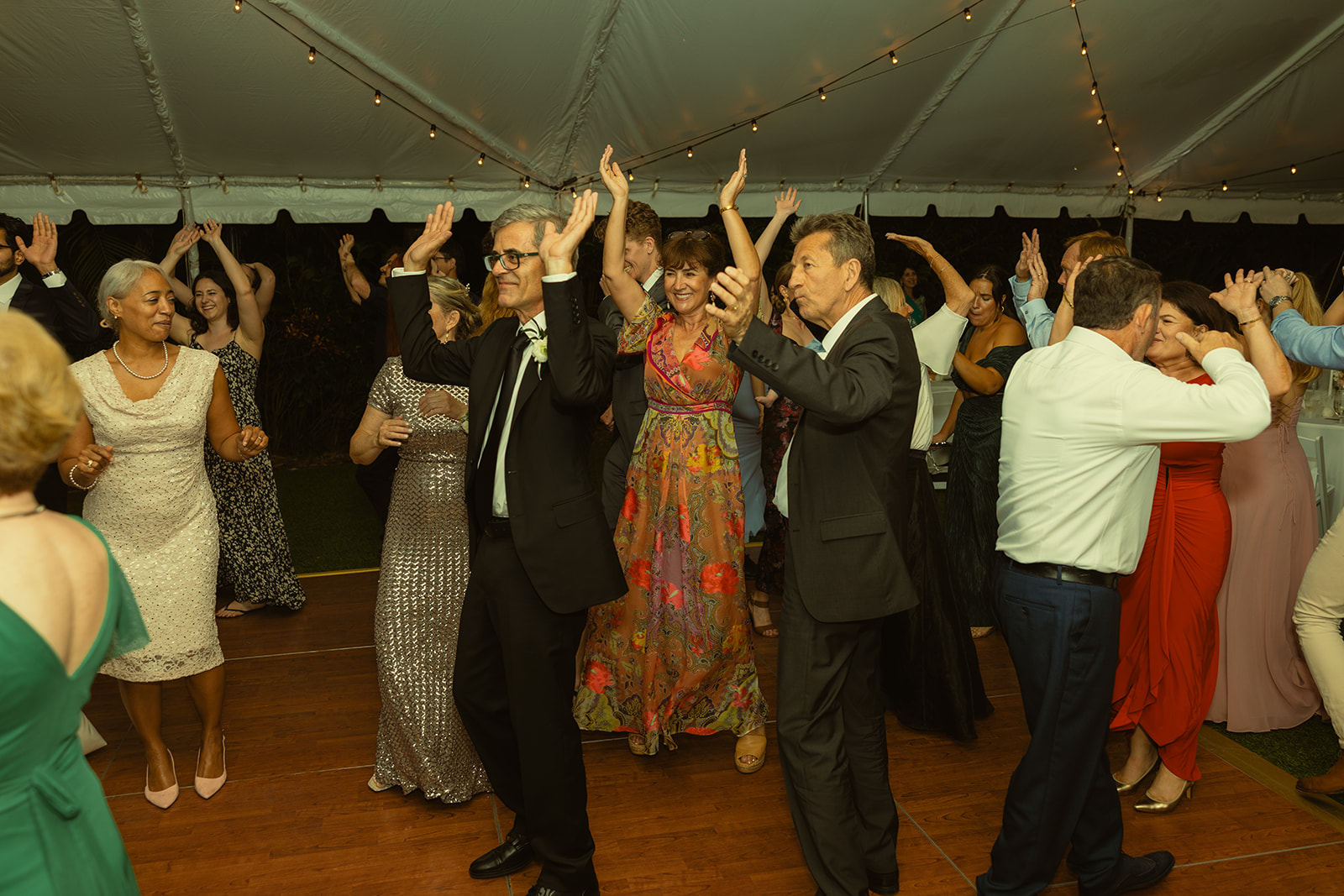 Guests Dancing candids during reception. Wedding in West Florida, St Petersburg in Sunken Gardens