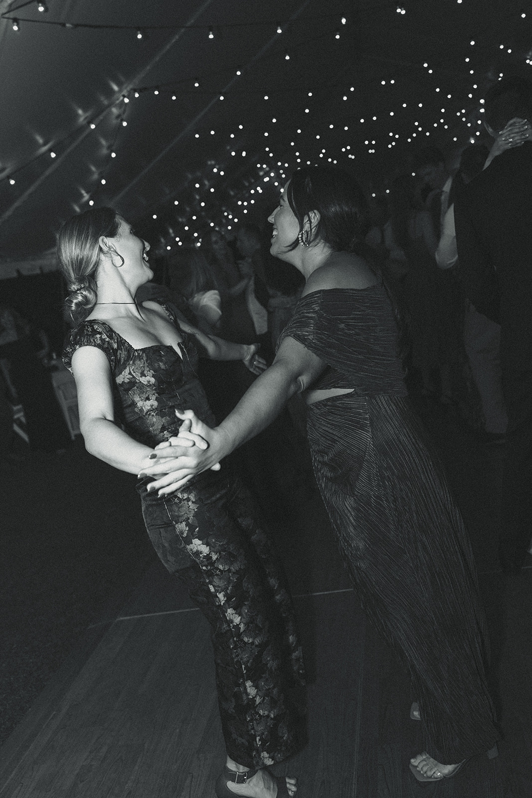 Guests Dancing smiling during reception. Wedding in West Florida, St Petersburg in Sunken Gardens