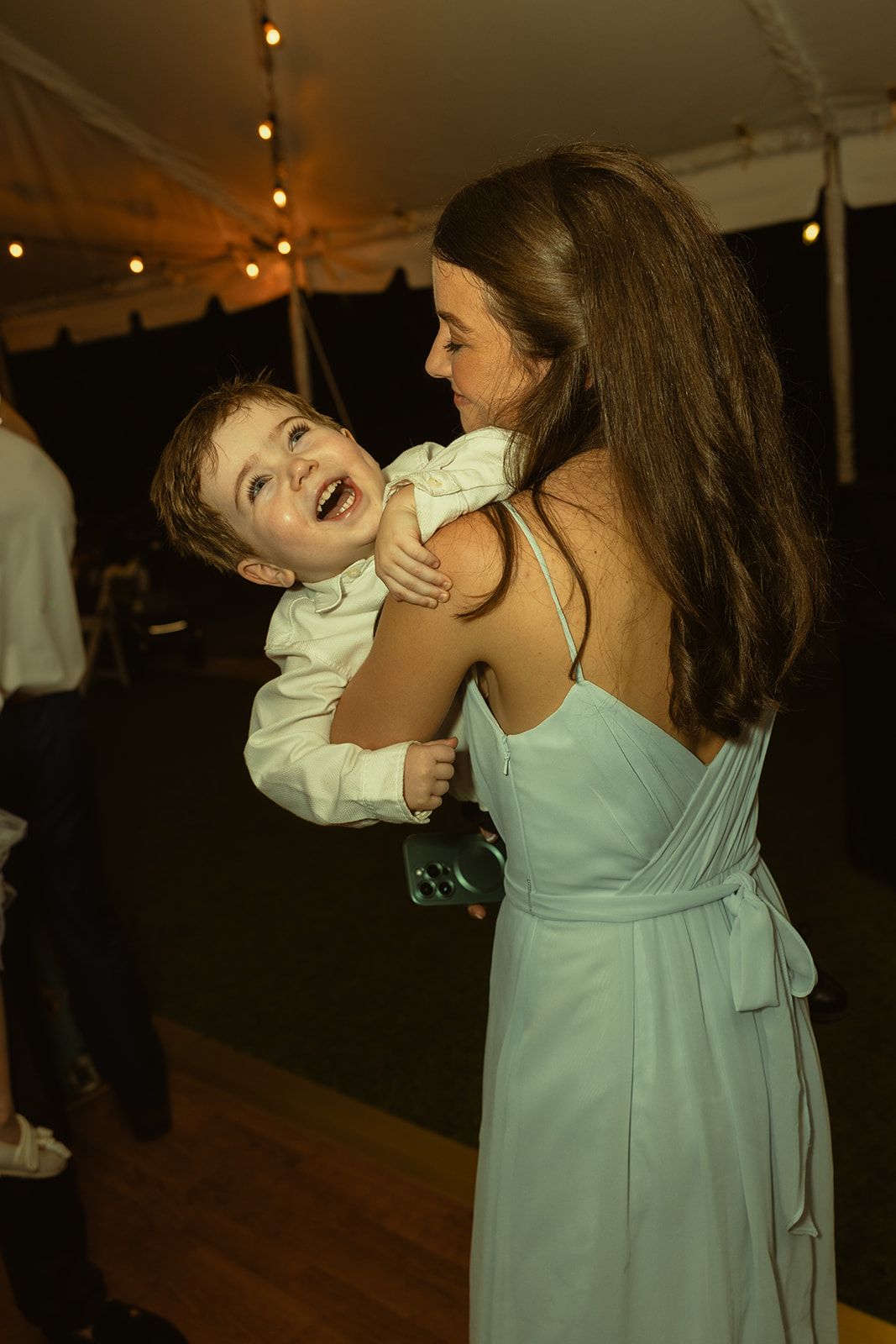 mom and son Dancing candids during wedding reception. Wedding in West Florida, St Petersburg in Sunken Gardens